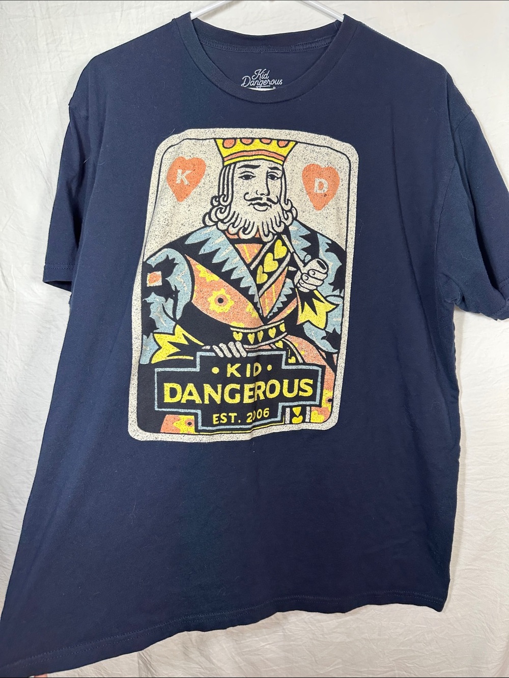 Kid Dangerous Navy Graphic Tee with Yellow, Orange and Light Blue Accents